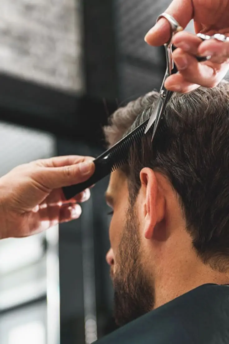 Men's haircut with scissors at Lotus Hair Salon