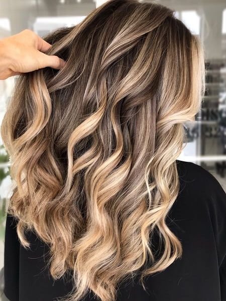 Dimensional foil and balayage colour from the original Lotus 2026 trends article