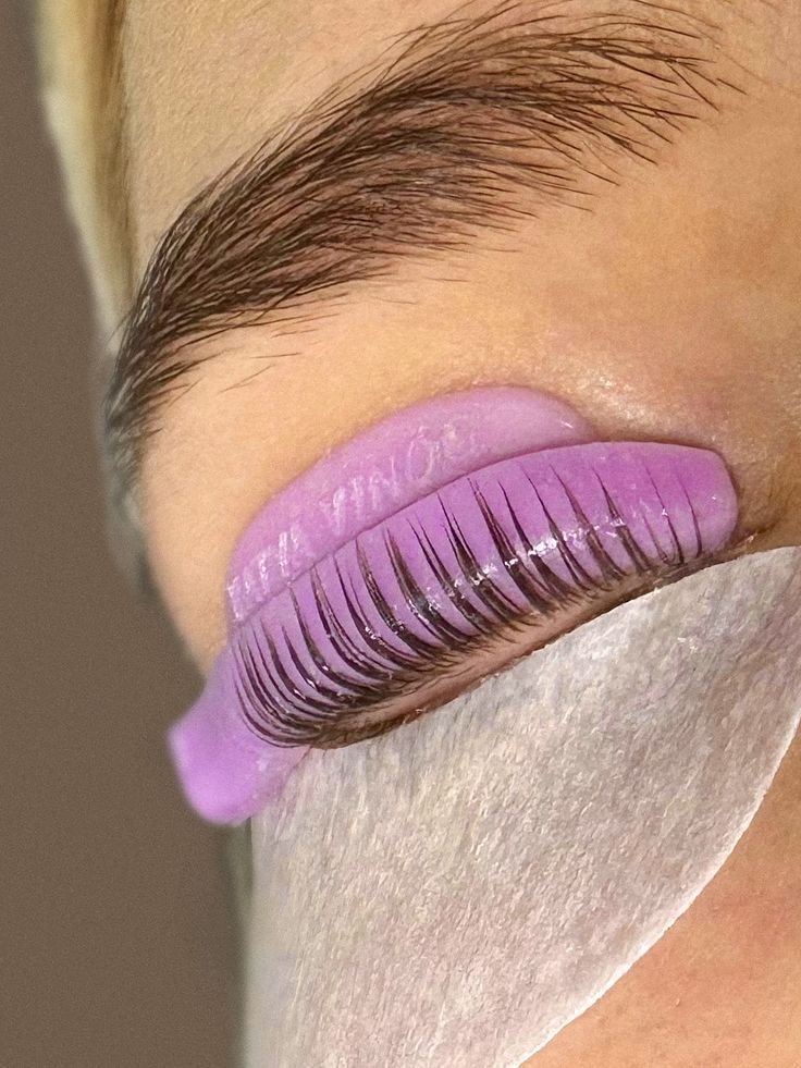 Separated lashes positioned on a silicone lifting shield